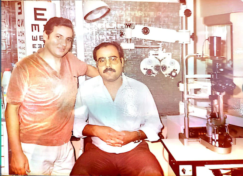 Charm Optical — 1980, Till this day, we don't know who that guy is. Lets call him Uncle Tom (the one standing)